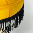 Load image into Gallery viewer, 20 inch a christmas story novelty neca leg lamp close up of the yellow shade and black fringe.
