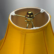 Load image into Gallery viewer, Neca A Christmas Story Novelty Leg Lamp close up of the yellow shade and top finial.
