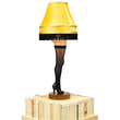 Load image into Gallery viewer, 26-inch deluxe tabletop leg lamp with gold polyester fringe shade, thigh-high fishnet stocking, and black stiletto heel, unlit
