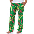 Load image into Gallery viewer, Man wearing A Christmas Story green leg lamp all-over print fleece pajama pants with red drawstring waistband
