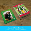 Load image into Gallery viewer, Buddy the Elf king of clubs playing card with raccoon scene next to poker size Elf deck

