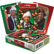Load image into Gallery viewer, Officially licensed National Lampoon's Christmas Vacation playing cards showing Clark Griswold wreath card back, King of Clubs, and Aunt Bethany 8 of Hearts with box
