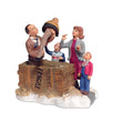 Load image into Gallery viewer, Department 56 Isn't It Beautiful figurine, A Christmas Story Village, family admiring leg lamp in crate

