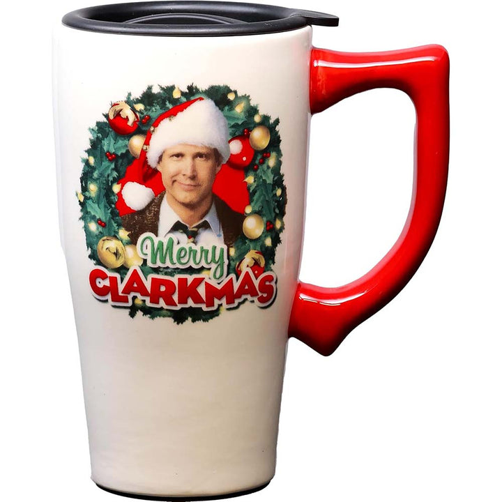 Merry Clarkmas ceramic travel mug featuring Clark Griswold in a wreath wearing a Santa hat.