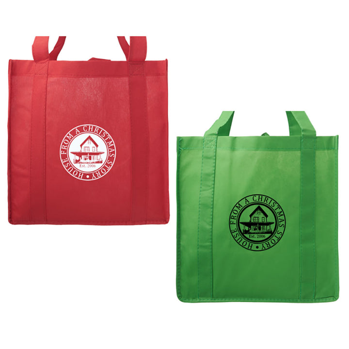Tote bag with house graphic laid flat