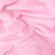 Load image into Gallery viewer, Close-up of soft plush polyester fabric used in pink bunny suit pajamas
